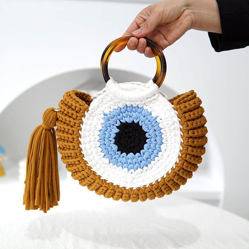brown evil eye crochet bag
