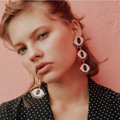 large evil eye statement earrings