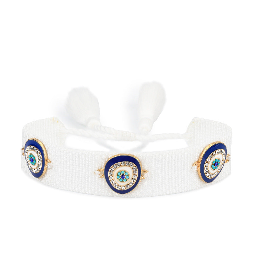 Pulsera tejida protectora contra el mal de ojo