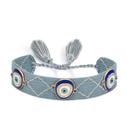 Pulsera tejida protectora contra el mal de ojo